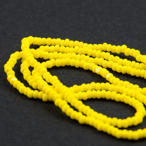0263 13/0 gold yellow opaque Charlotte bead