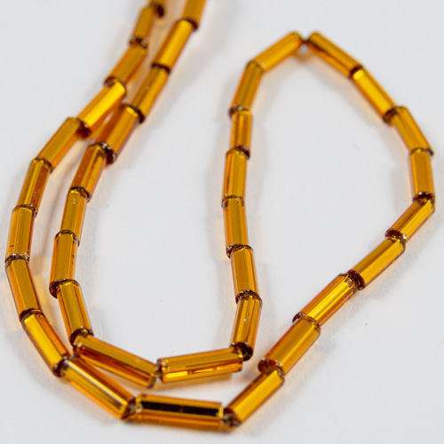 0306 Bugle #3 deep gold transparent silver lined