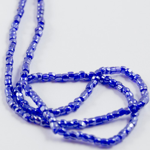 0168 12/0 3-cut bead transparent iridescent blue