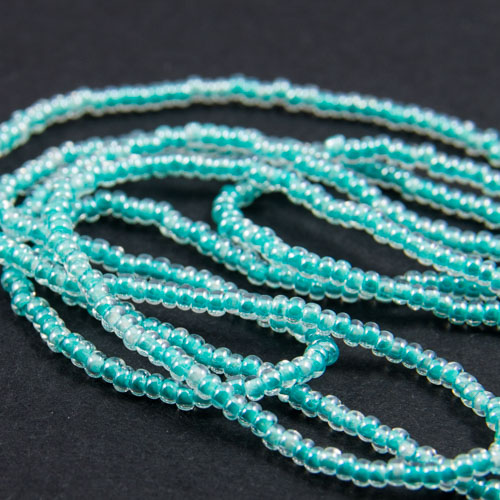 0253 Half hank 13/0 sead bead transparent turquoise lined