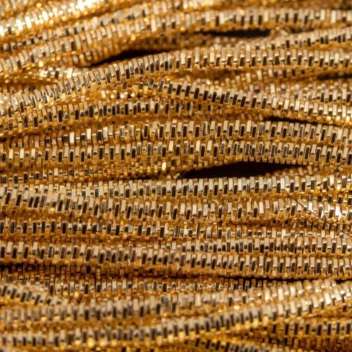 AA107. Gold colour bright check purl 1.3mm (3 metres)